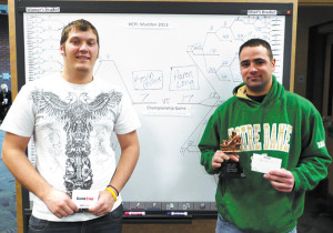 HCPL photo/Christy BeaverAaron Long (right) took home the first place trophy in the Hancock County Public Library’s Madden video game tournament, January 26, 2013. This was his second time winning the annual contest. Kevin Miller took second place. Forty seven players competed in the all-day football competition using Xbox consoles on loan from GameStop. 