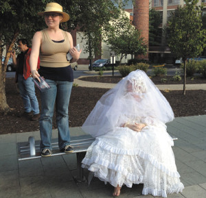Ethel Winslow/Weekly ViewStreet performers and IndyFringe performers drum up business along Mass Ave. 
