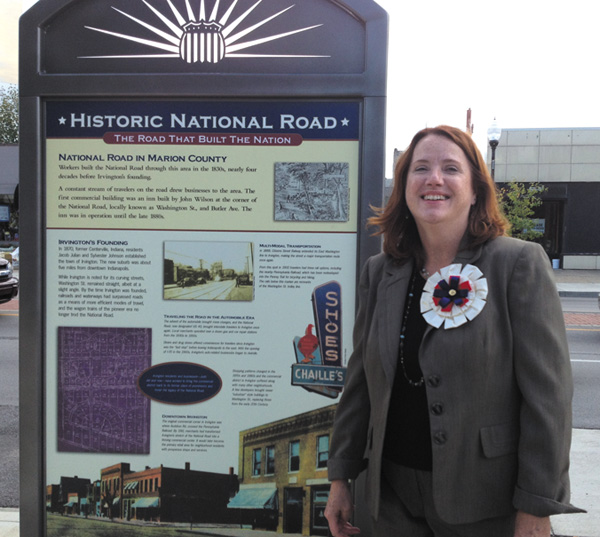 Ethel Winslow/Weekly View Margaret Banning, Executive Director of Irvington Development Organization, lead the Sept. 21 celebration of the official opening of the Irvington Streetscape, Phase I, and the unveiling of the Historic National Road Marker on East Washington. Phase II of the Streetscape project will involve East Washington from Ritter to Emerson Ave. and will begin soon.