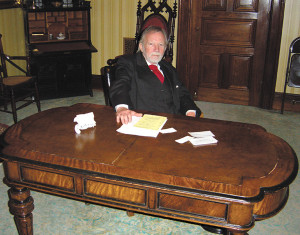 submitted photoEd Myers as Benjamin Harrison at Harrison's desk at his historic home. The desk went with the president to the White House and returned after his term in office.