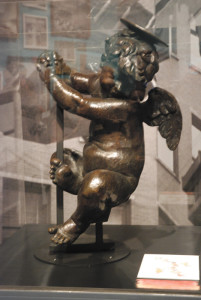 Photo by C.J. Woods, III/Weekly View Bronze cherub that sits atop the Ayres Clock.