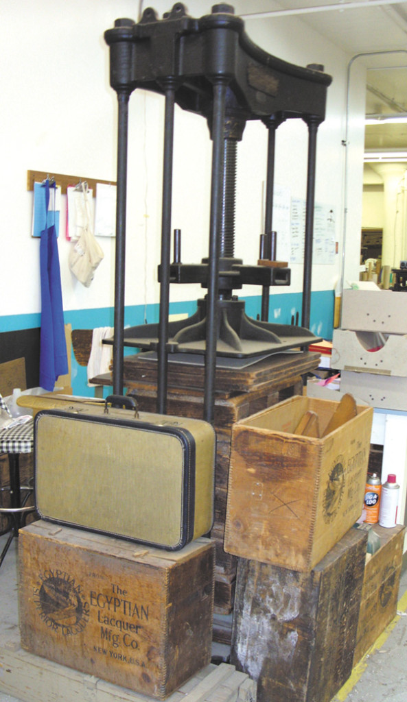 Photo by Ethel Winslow/Weekly View

An early 1900s book press at the National Library Bindery Company, which is still used.