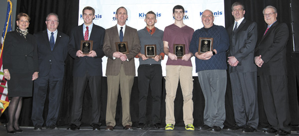 submitted photo(L-R) Downtown Kiwanis Club President Karen Burns, IHSAA Commissioner Bobby Cost, North Central HS senior Carter Herman, Scecina Principal Joe Therber (representing Jacob Okerson), Beech Grove senior Tommy Piche, Roncalli senior Tyler Schoettle, Greg Smith (representing son Ethan Smith of Covenant Christian HS), NextGear Capital CFO David Horan, Pacers Sports & Entertainmen’t Bill Benner.