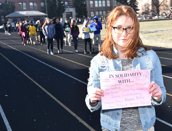 CJ Woods III/Weekly ViewMadeline Anderson, who held a sign with the names of students killed in Parkland, Florida.