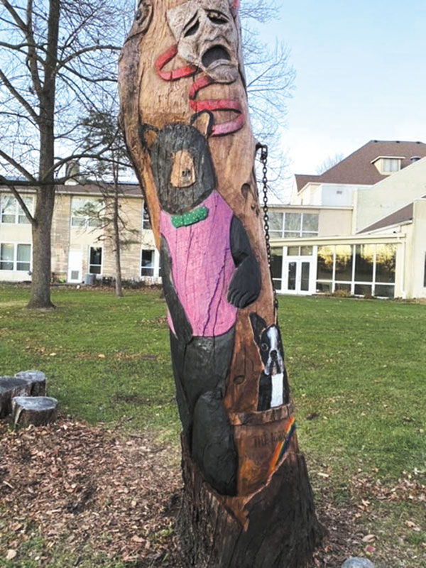 submitted photoThe congregation at Cumberland First Baptist Church recently honored Kevin D. Rose, co-pastor, who died in 2018. The carved tree in front of the building represents his love for theater, as well as his many interests. It is close to the labyrinth on the property that was created for quiet meditation. The carving was done by Phil Campbell.