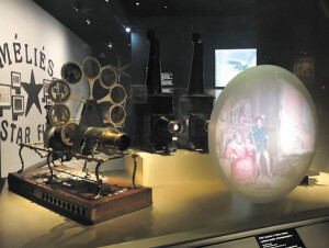 Photos by Paula Nicewanger/Weekly view(Top) One of the exhibits of film props and poster in the Cinema museum (bottom) One of the displays of very early projectors used in film making.
